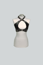 Load image into Gallery viewer, Black patent leather halter top with studs on a mannequin against a gray background