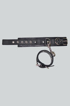 Load image into Gallery viewer, Black leather hand &amp; ankle cuffs on a light gray background